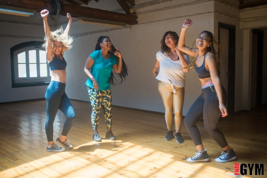 4 women dancing in a studio