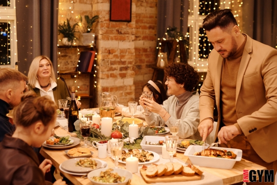 family at dinner table for christmas